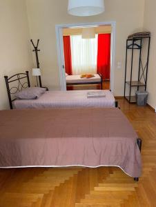 Postel nebo postele na pokoji v ubytování Petaluda House 5