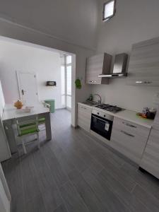 A kitchen or kitchenette at Casa Paola