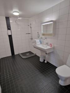 Koupelna v ubytování Nr4 På Spåret + 9 fotografií