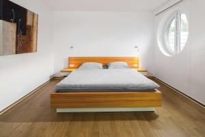 Postel nebo postele na pokoji v ubytování Winkelschiffchen I mit Sauna