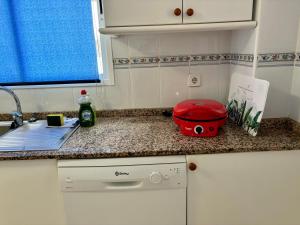 Kuchyň nebo kuchyňský kout v ubytování Apartamento Bulevar en Playa Albir