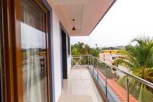 a balcony with a view of the city at Casa Quina Heritage#5 in Taleigao +10 photos