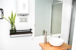 Koupelna v ubytování La Cocotera Boutique Hostel & Coworking + 55 fotografií