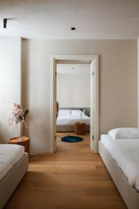 Postel nebo postele na pokoji v ubytování C10 Boutique Hotel