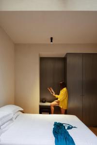 Postel nebo postele na pokoji v ubytování C10 Boutique Hotel