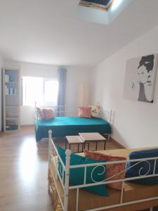 a bedroom with two bunk beds and a bed at La maison du pêcheur in Bouzigues