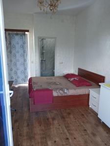 Postel nebo postele na pokoji v ubytování Dom Mzekala