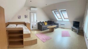 Posezení v ubytování Apartmany U Stareho Labe