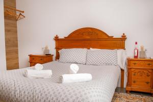 Postel nebo postele na pokoji v ubytování HOTEL BODEGA VERA DE ESTENAS