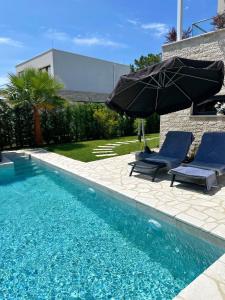 Outdoor pool and stone deck at San Pietro Villa 3B-18