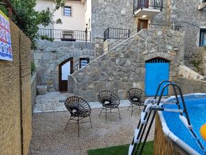 Bazén v ubytování Villa Nautia Stone House nebo v jeho okolí