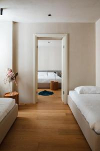 Postel nebo postele na pokoji v ubytování C10 Boutique Hotel