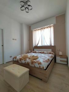 Postel nebo postele na pokoji v ubytování Dimora Giovanni