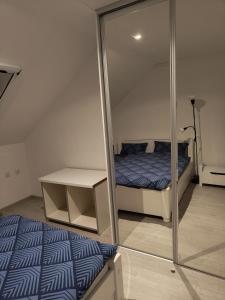 Postel nebo postele na pokoji v ubytování Miki Private Room