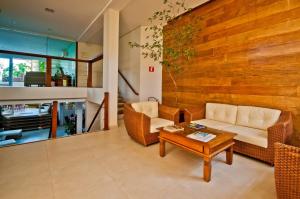 Uma área de estar em Juquehy La Plage Hotel