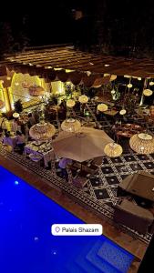 a model of a cruise ship with a table and chairs at Palais Shazam & SPA in Fès
