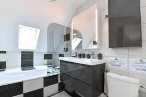 Vannituba majutusasutuses Appartement Côté Vignes avec Terrasse et Parking