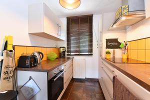 Köök või kööginurk majutusasutuses Appartement Côté Vignes avec Terrasse et Parking