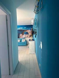 Letto o letti in una camera di Santorini in Finale