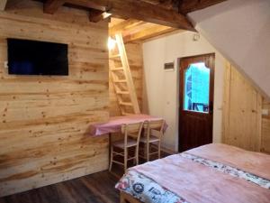 Postel nebo postele na pokoji v ubytování Konaci Gradina 3