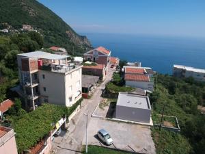 an aerial view of a city with the ocean at Montenegrina Apartment in Budva