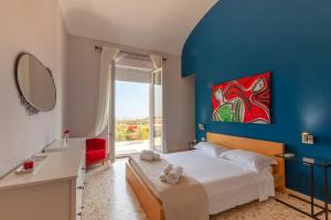 Кровать или кровати в номере VILLA a Sud