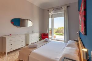 Кровать или кровати в номере VILLA a Sud