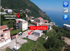 a sign that says free parking next to a building at Montenegrina Apartment in Budva