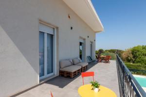 Балкон или терраса в VILLA a Sud
