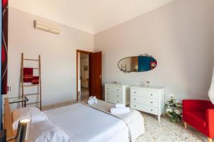 Кровать или кровати в номере VILLA a Sud