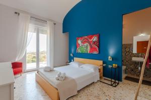 Кровать или кровати в номере VILLA a Sud