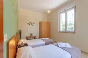 Кровать или кровати в номере VILLA a Sud