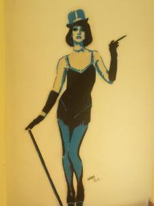 a drawing of a woman in a dress and hat at Art & Jazz Hotel in Catania