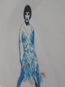 a drawing of a woman in a blue dress at Art & Jazz Hotel in Catania