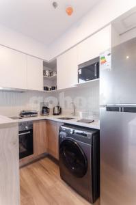 Kuchyň nebo kuchyňský kout v ubytování Loft Near Shopping Mcal Lopez And Villa Morra