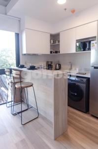 Kuchyň nebo kuchyňský kout v ubytování Loft Near Shopping Mcal Lopez And Villa Morra
