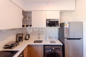 Kuchyň nebo kuchyňský kout v ubytování Loft Near Shopping Mcal Lopez And Villa Morra