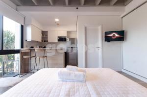 Kuchyň nebo kuchyňský kout v ubytování Loft Near Shopping Mcal Lopez And Villa Morra