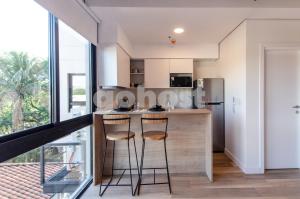 Kuchyň nebo kuchyňský kout v ubytování Loft Near Shopping Mcal Lopez And Villa Morra