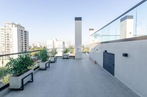 Balkón nebo terasa v ubytování Loft Near Shopping Mcal Lopez And Villa Morra