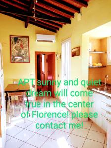 a kitchen with a sink and a counter top at Apt bright, quiet! In the center. in Florence