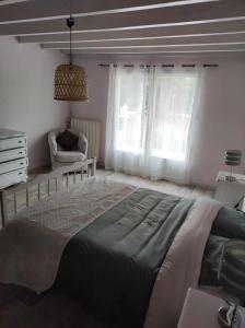 Postel nebo postele na pokoji v ubytování Le gîte Gabriel