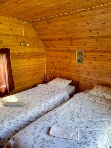Postel nebo postele na pokoji v ubytování Little Garden House