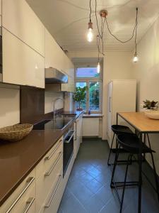 Dapur atau dapur kecil di Cozy Rosy, dein feinzeit Apartment #Parkplatz gratis #Altstadt #Garten