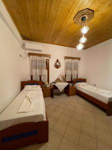 Postel nebo postele na pokoji v ubytování Guesthouse Klajd