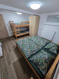 a bedroom with a large bed in a room at Apartments Boldin in Bled +41 photos