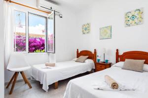 Postel nebo postele na pokoji v ubytování Villa Lantana by Villa Plus