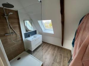 a bathroom with a glass shower and a sink at Grande maison de famille - Le Petit Pontébart in Paimpol +22 photos