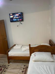 Postel nebo postele na pokoji v ubytování Guesthouse Klajd