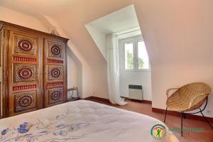 Una cama o camas en una habitación de L'escale oceane